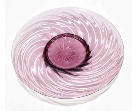 JAMES POWELL FOR WHITEFRIARS; a pale amethyst tinted wrythen moulded bowl, unmarked, diameter 30cm.Additional InformationIn g
