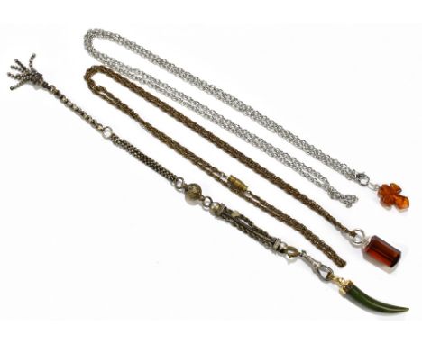 A white metal chain supporting an amber cross pendant, length 37cm, with a late Victorian lady's fob chain supporting a jade 
