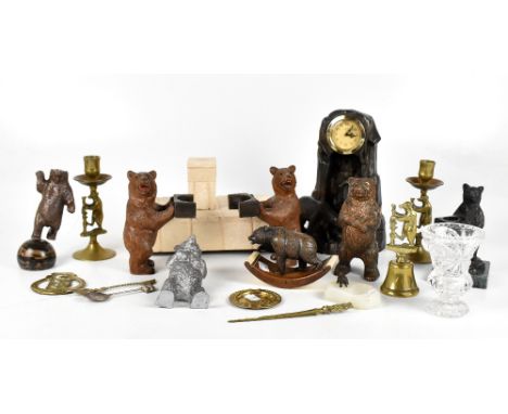 A collection of bear related items, including bronzed spelter German mantel clock with contemporary brass plated dial above t