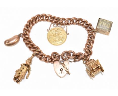 A 9ct rose gold charm bracelet with 9cy clasp set with half sovereign dated 1911 and four charms, three of which are 9ct gold