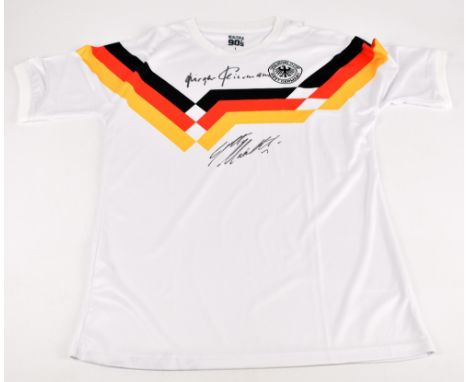 GERMANY; a 1990 retro shirt, signed by Matthaus and Klinsmann to the front, size L.
Additional InformationCreasing and light 