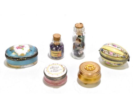 Four assorted trinket boxes including two porcelain examples, one in the form of an egg, possibly Limoge, an enamel example e