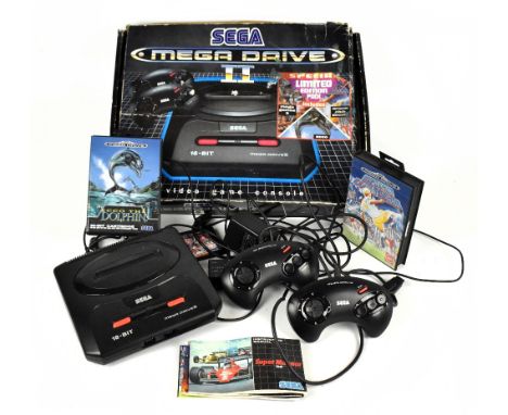 SEGA; a boxed Megadrive console, with two games, European Club Soccer and Ecco the Dolphin, and a further unboxed game Alien 