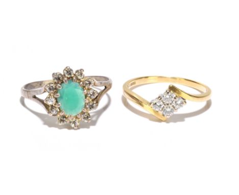 An 18ct yellow gold and four stone diamond ring of swept design with lozenge central claw set panel, size O, approx 2.8g, and