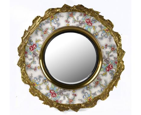 ART MASTER; a 1930s/40s ceramic wall mirror with gilt metal border, with floral decoration, diameter 47cm.Additional Informat