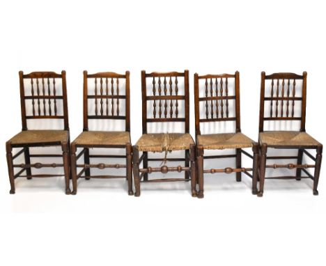 A set of five ladder back dining chairs (4+1).