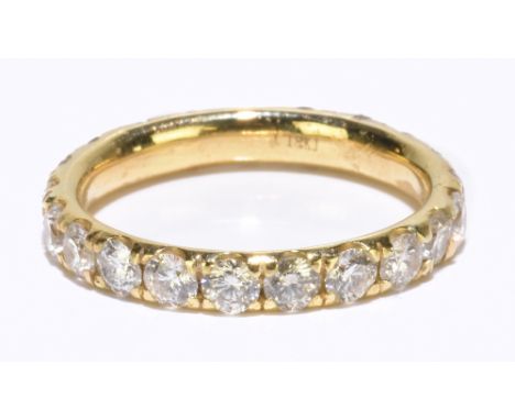 An 18ct yellow gold diamond set full eternity ring, each round brilliant cut stone weighing approx 0.07ct, size O, approx 3.4