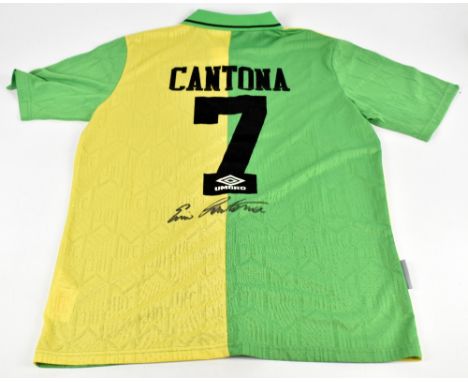 ERIC CANTONA; an Umbro Manchester United 1992-1994 season retro reproduction away shirt, signed to reverse, size 2XL.
Additio