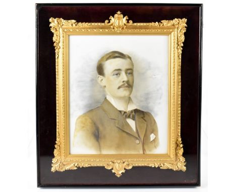 ENGLISH SCHOOL LATE 19TH CENTURY; watercolour on opaque glass panel, portrait of a gentleman, 29 x 24cm, in elaborate gilt wo
