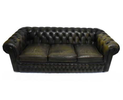 A modern green leather Chesterfield settee, with button back and arms and button front, height 67cm, width 207cm, depth 94cm.