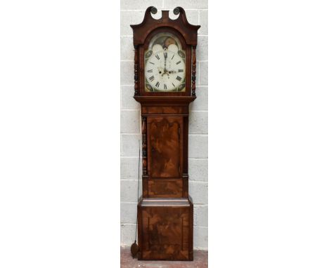 An early to mid 19th century mahogany and rosewood crossbanded longcase clock, the broken swan neck pediment above arched pai