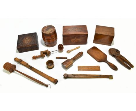 An assortment of 19th century and later treen, including a cylindrical box and cover in the form of a barrel, pastry crimpers