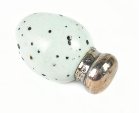ATTRIBUTED TO MACINTYRE; a mottled pale blue egg shaped scent bottle with silver cap hallmarked London 1885, length 3.5cm.Add