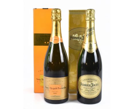 CHAMPAGNE; two bottles comprising Perrier Jouet Grand Brut and one bottle of Veuve Clicquot Ponsardin Vintage 2002, each boxe