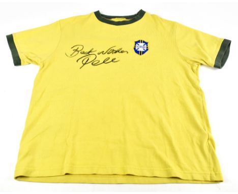 PELÉ (EDSON ARANTES DU NASCIMENTO); a 1970s Brazil home shirt, signed and further inscribed ‘Best Wishes’ to the front.
Addit