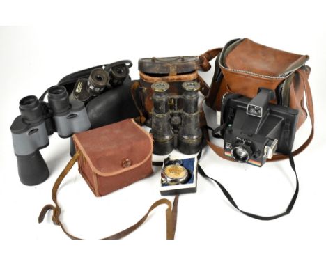 A pair of WWI French military issue binoculars by Lemaire, the extending lacquered brass barrels engraved with a military arr