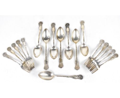 A sterling silver twenty-six piece part cutlery service, each with scrolling decoration to the handles, comprising ten dinner