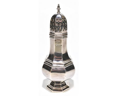 A hallmarked silver octagonal sugar caster of baluster form, hallmarks obscured, height 17cm, approx 5.5ozt/171.9g.Additional