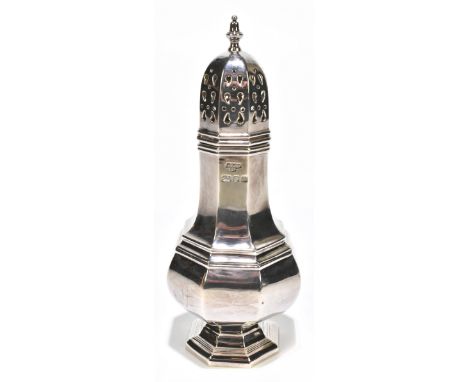 A hallmarked silver octagonal sugar caster of baluster form, hallmarks obscured, height 17cm, approx 5.5ozt/171.9g.Additional