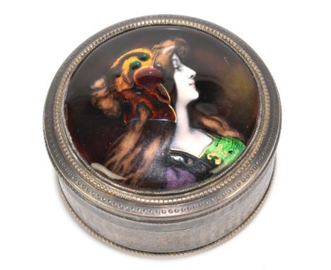 LIMOGES; a French silver circular box, the lid set with a circular enamelled plaque depicting the profile portrait of a femal