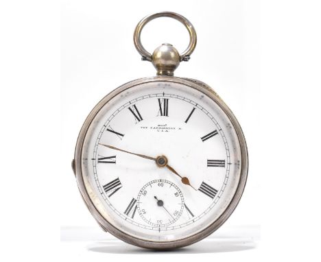 A hallmarked silver key wind pocket watch with white enamel dial set with Roman numerals and subsidiary seconds dial, inscrib