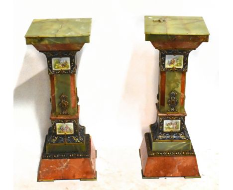 A pair of early 20th century highly decorative onyx and rouge marble jardinere stands, the square onyx tops above the shaped 