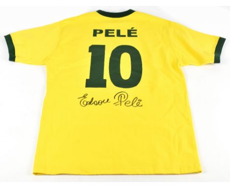 PELÉ (EDSON ARANTES DU NASCIMENTO); a 1970s Brazil home shirt, signed to back, size S.
Additional InformationCreasing and lig