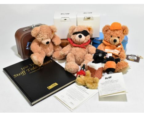 STEIFF; three suitcase bears, two limited edition Steiff Christmas Ornament bears, and a 100 Years Steiff teddy bears book (6