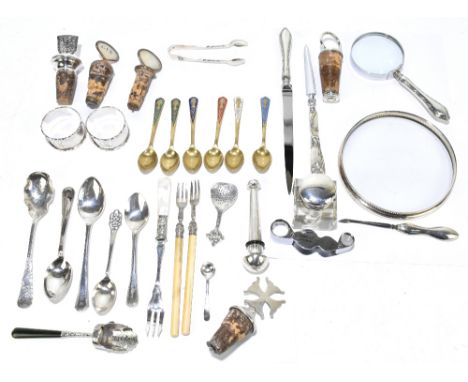 An assortment of hallmarked silver gilt metal and white metal items to include a silver mounted glass bottle coaster, Birming