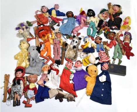 A quantity of Pelham puppets including 'Animal' from the Muppets also further vintage glove puppets including Sooty, Sweep an