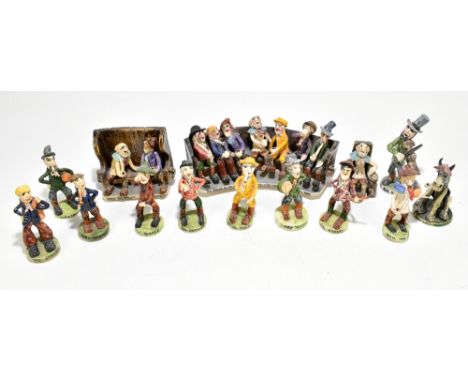 WILL YOUNG; a pottery figure group of seven characters seated upon a tavern bench, length 26cm, a smaller double group and tw