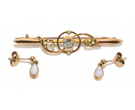 A 15ct yellow gold Edwardian seed pearl decorated brooch, length 48mm and a pair of yellow metal opal drop earrings, combined