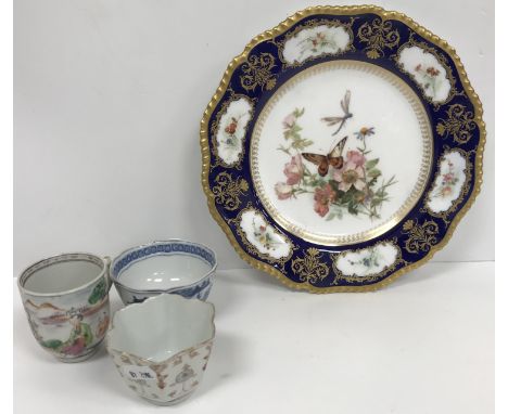 A Royal Worcester cabinet plate with blue and gilt banded border decorated with wildflowers, the centre field decorated with 