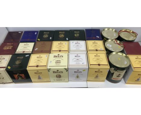 A collection of Bells Blended Scotch Whisky Christmas decanters, 1988-2010 and 2012, all with original cardboard packaging (2