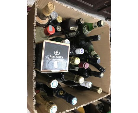 A box of various mixed wines and spirits including Remy Martin Champagne Cognac (original cardbooard box), Johnnie Walker Bla