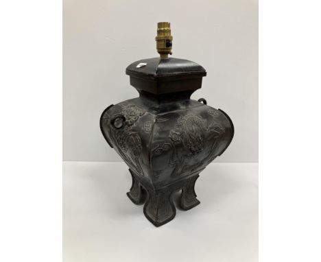 A 19th Century Chinese bronze vase of square section form decorated with dragons raised on four feet now as a lamp 30.5 cm ex