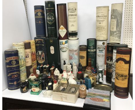 A box of 24 various pottery and other bottled spirit miniatures including QE2 Single Malt Twelve Year Old Whisky, Glen Calder
