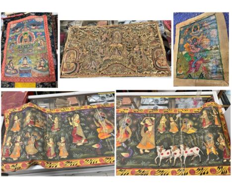 A 20th Century Tibetan thangka depicting a central figure in lotus position with bowl amongst numerous other figures 61 cm x 