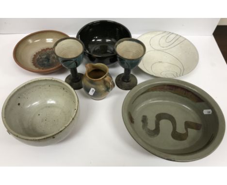 A collection of studio ware pottery to include a shallow bowl wth line decoration, bears maker's mark "PP" to baack, a pair o