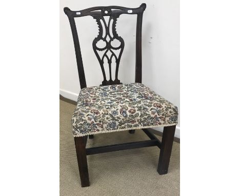 An 18th Century Scottish laburnum dining chair of Chippendale design with carved pierced back splat over an upholstered seat 