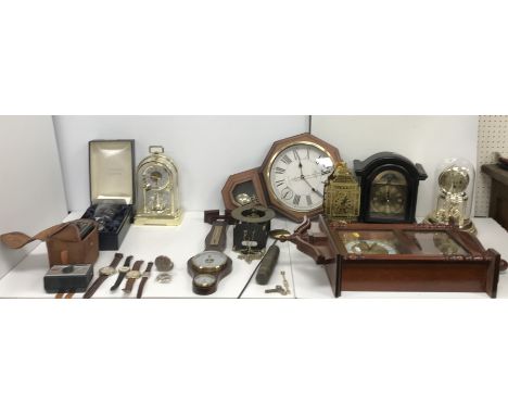 A collection of various modern clocks including a Franklin Mint skeleton type clock, Bentima drop dial wall clock, Actim drop