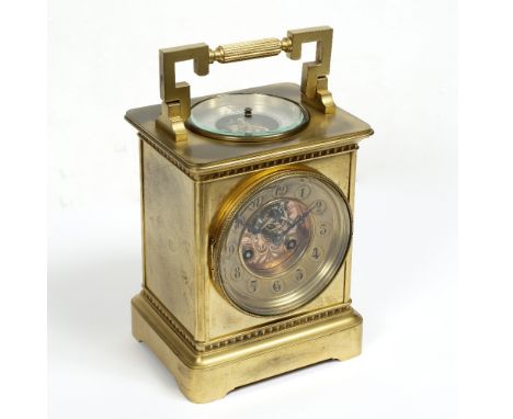 A LATE 19TH CENTURY FRENCH GIANT CARRIAGE CLOCK the two piece dial with stylised Arabic chapters and foliate scroll engraved 