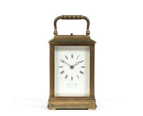 A 19TH CENTURY FRENCH CARRIAGE CLOCK, the white enamel Roman dial inscribed Hamilton &amp; Co, Calcutta and Simla' silvered p
