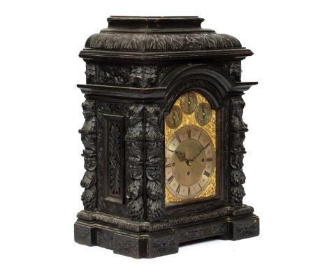 A LATE VICTORIAN/EDWARDIAN BRACKET CLOCK, the break arch brass dial with silvered Roman chapter ring, Arabic five minutes to 