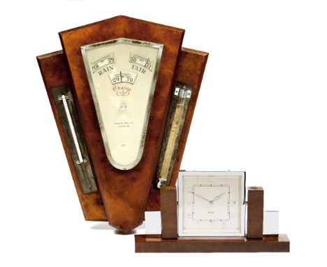 AN ART DECO BURR WALNUT VENEERED WALL HANGING ANEROID BAROMETER the silvered dial inscribed 'Chadburns Ltd, Liverpool', flank