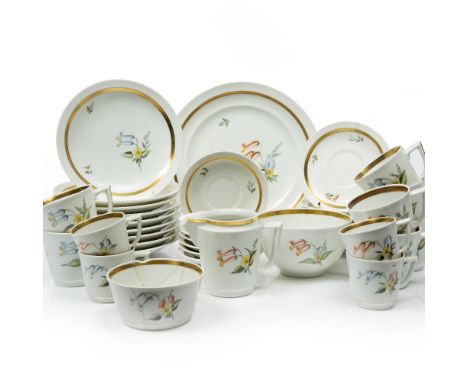 A ROYAL COPENHAGEN PART TEA AND COFFEE SERVICE, decorated with floral sprigs, comprising milk jug, two sugar basins, nine tea