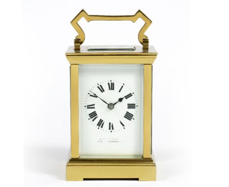 A FRENCH CARRIAGE CLOCK, with white enamel Roman dial, indistinctly signed W...Ford &amp; Son, Exeter and Eastbourne, the mov