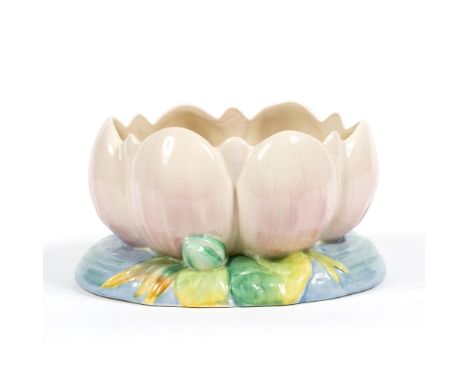 A CLARICE CLIFF WATER-LILY PLANTER, with pale pink petals, printed marks, 20cm wide