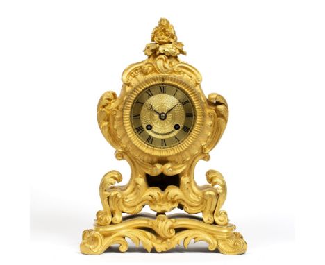 A 19TH CENTURY FRENCH ORMOLU MANTEL CLOCK, the engine turned Roman dial signed Raingo Freres a Paris, the twin train drum mov