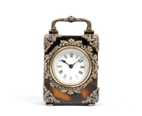 A LATE VICTORIAN TORTOISESHELL AND SILVER MOUNTED CARRIAGE TIMEPIECE with circular white enamel Roman dial and French movemen